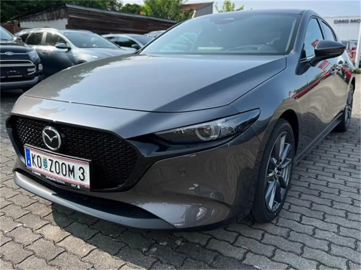 Mazda 3 e-Skyactiv-G140 AT Exclusive-Line Grau - 1