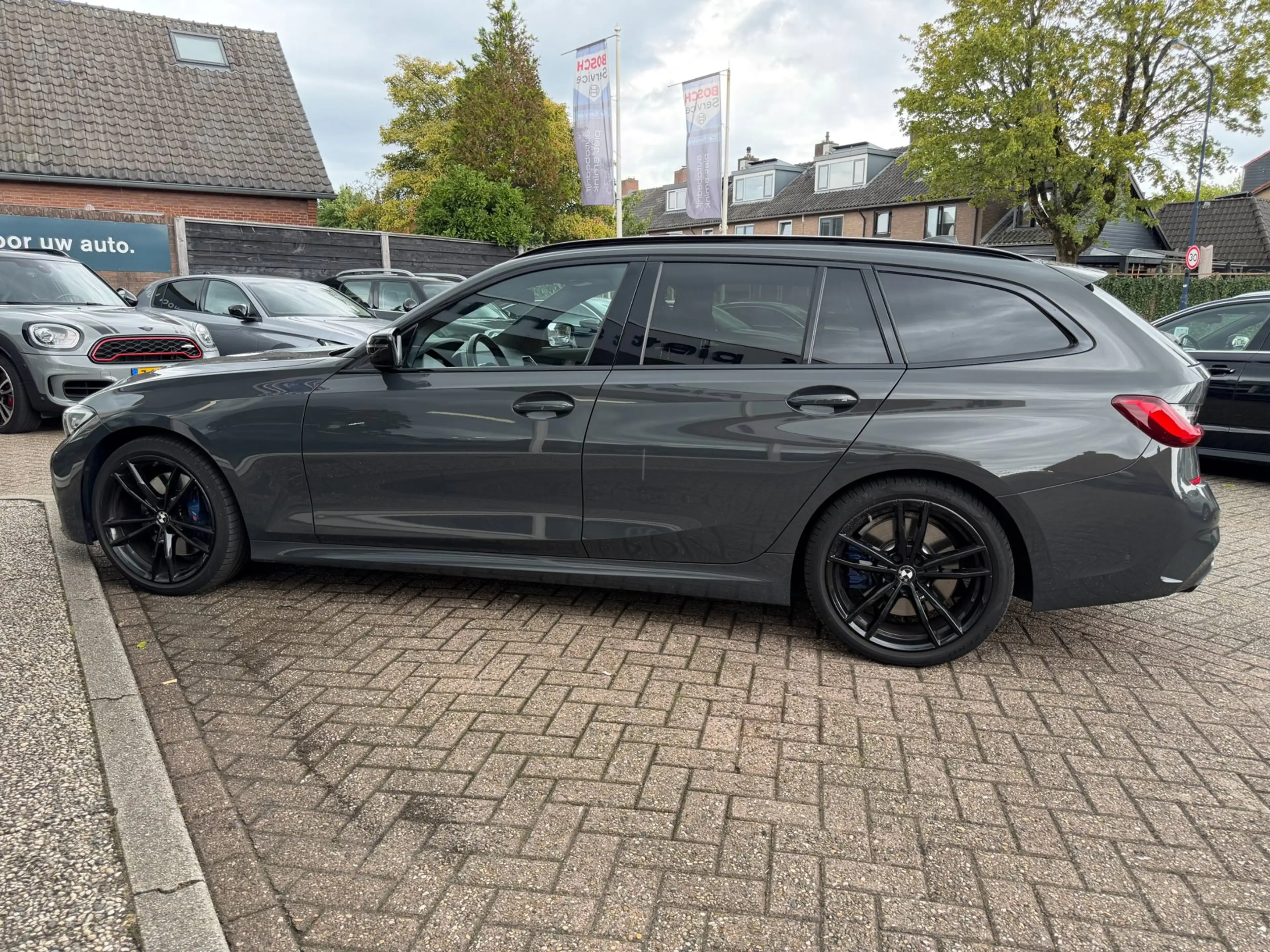 BMW 340 3-serie Touring M340i xDrive High Executive — photo 34