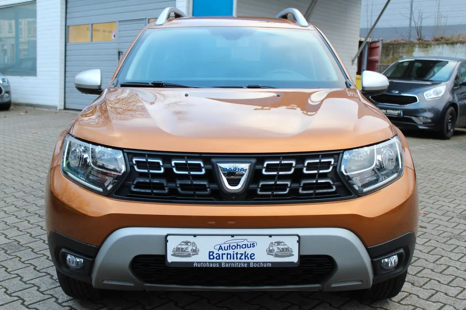 Dacia Duster II Prestige *Klimaautomatik*Navi*Kamera Orange - 2