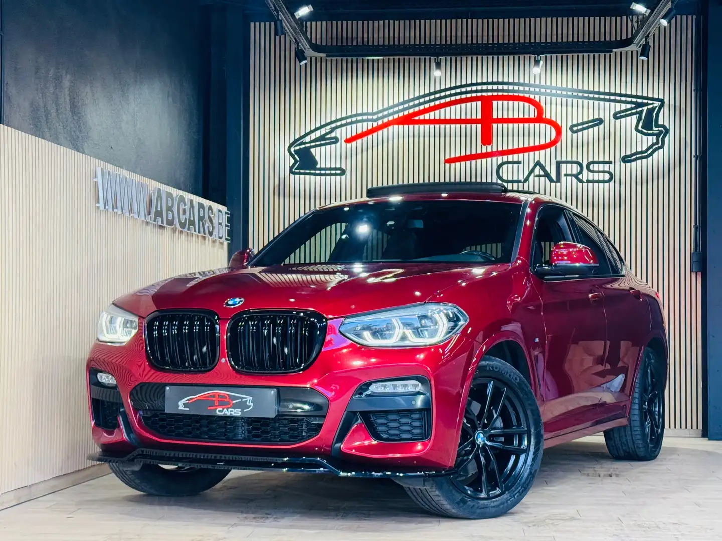BMW X4 2.0iA xDrive20 * LOOK X4M / PACK M * GAR 12 MOIS * Rood - 1