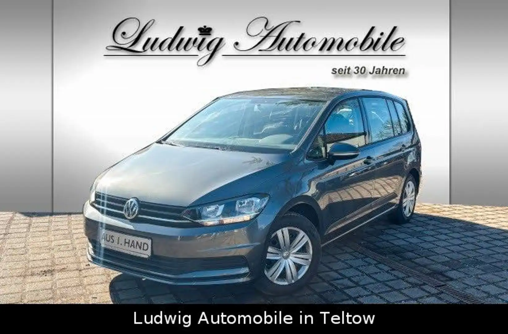 Volkswagen Touran 1.2 TSI *1.Hand*7-Sitze*6-Gang Grau - 1