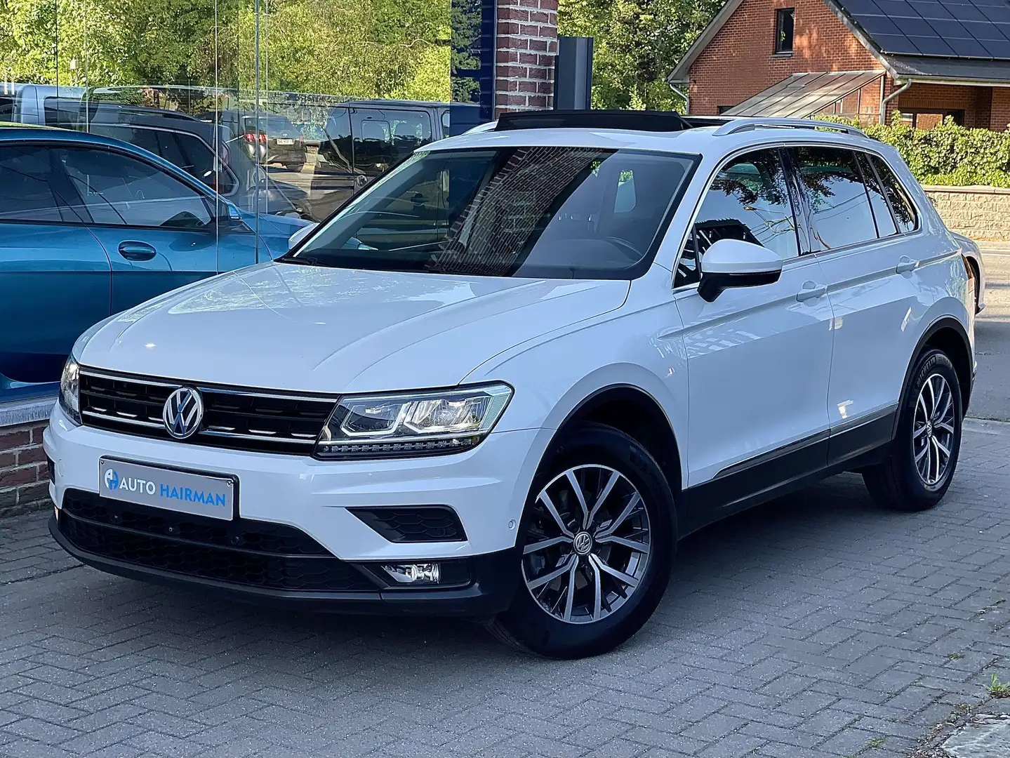 Volkswagen Tiguan 2.0 TDi SCR HIGHLINE ÉDITION *PANO *GPS *CARPLAY Weiß - 1