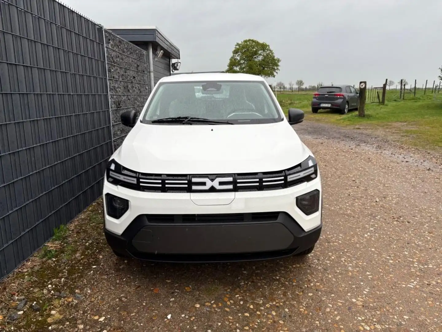Dacia Spring Electric 45 MJ25 Expression Navi  Lager 33 kW (... Weiß - 1