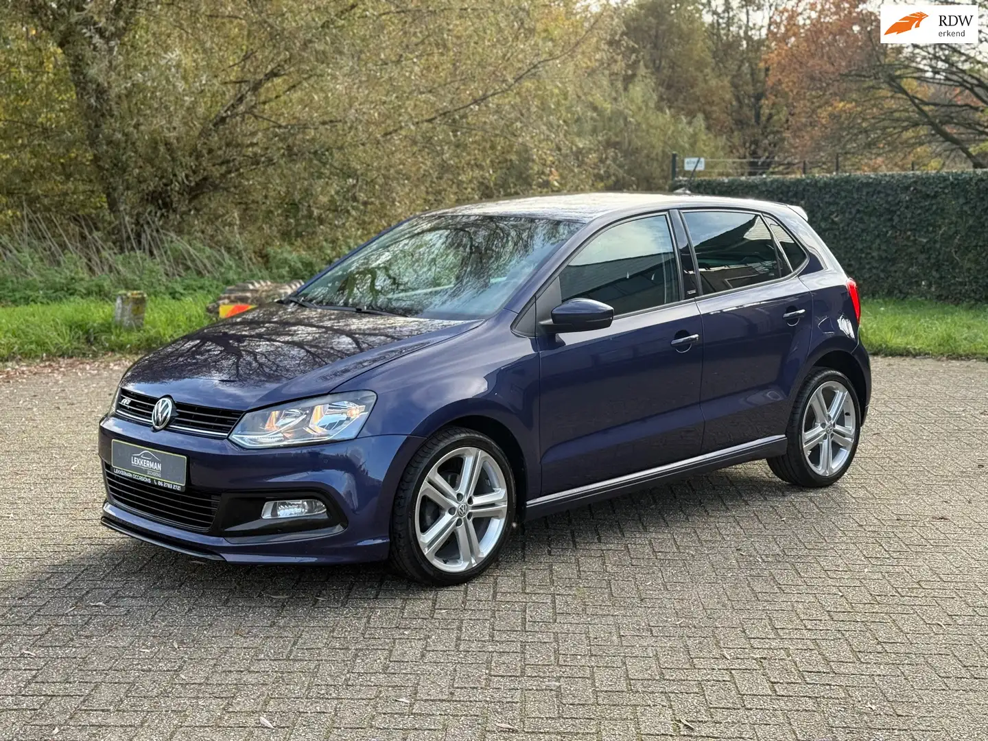 Volkswagen Polo 1.2 TSI R-LINE U 82117KM I NAVI I PDC I 1E EIG I U Blauw - 1