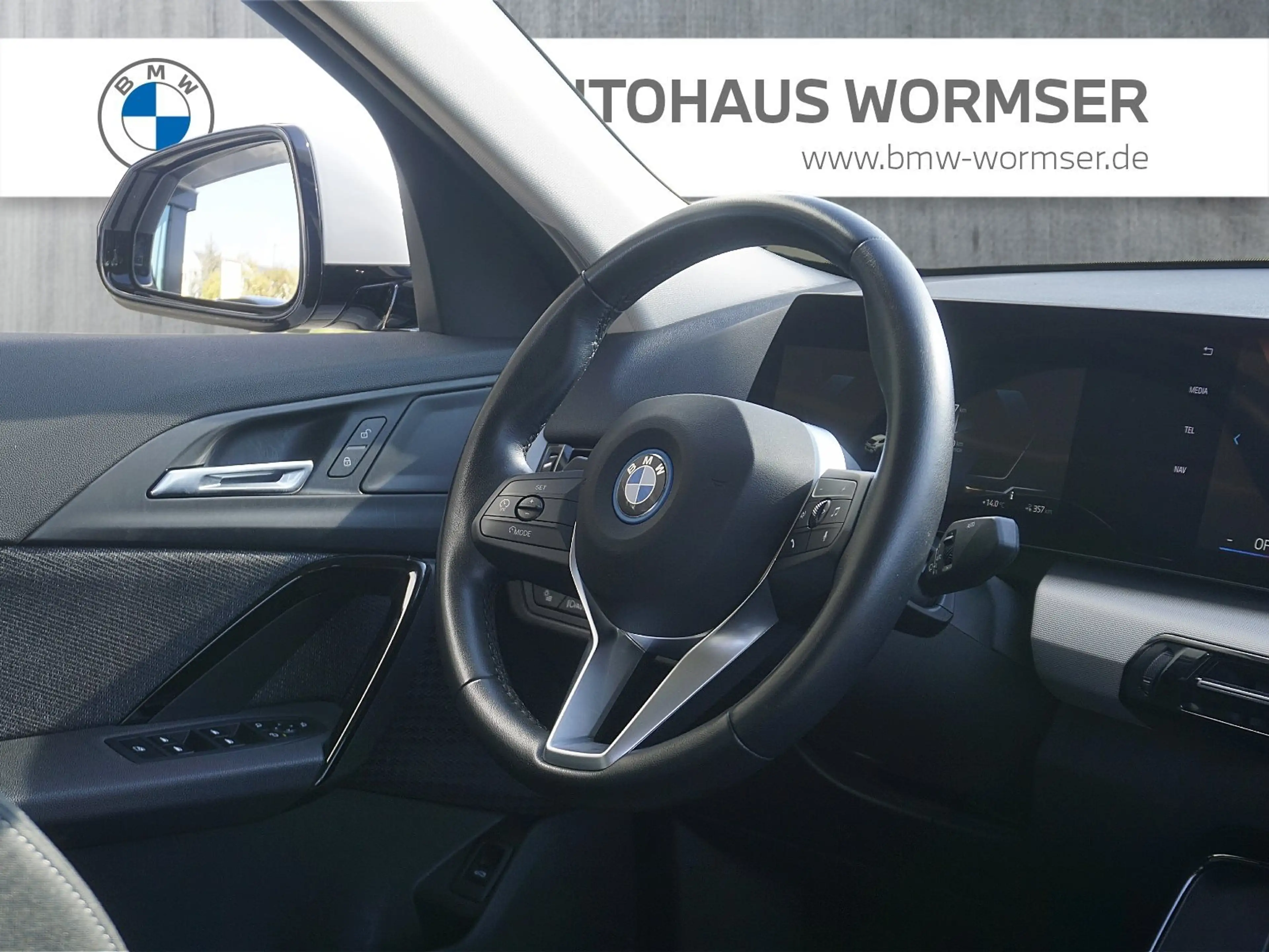 BMW iX2 xDrive30 — photo 11