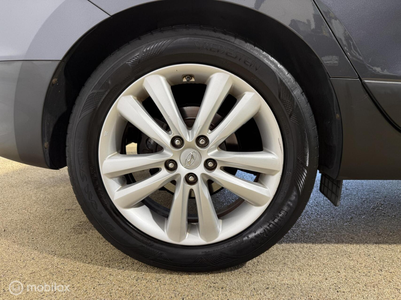 Hyundai iX35 2.0i 4WD Style CRUIS/CLIMA/PANO/CAM/NAVI/APK — photo 14
