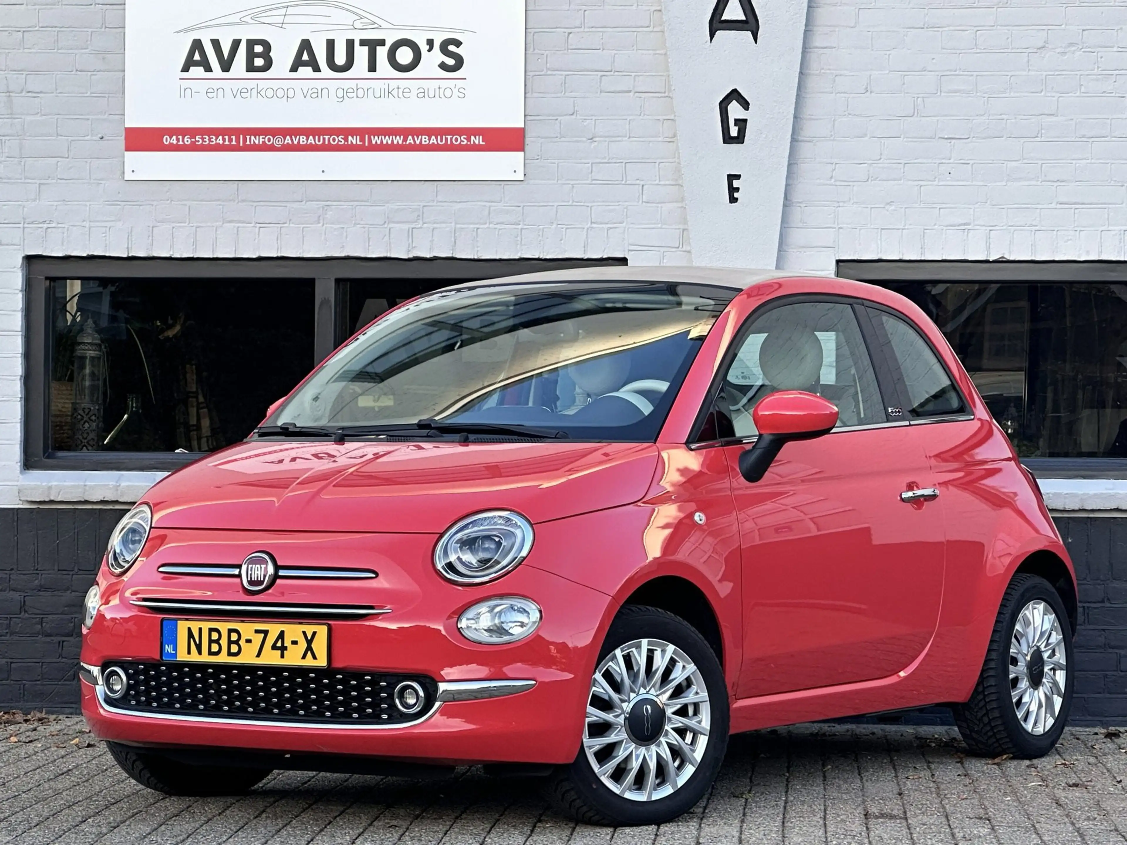 Fiat 500C 1.2 Lounge Cabrio Koraal Clima Cruise PDC