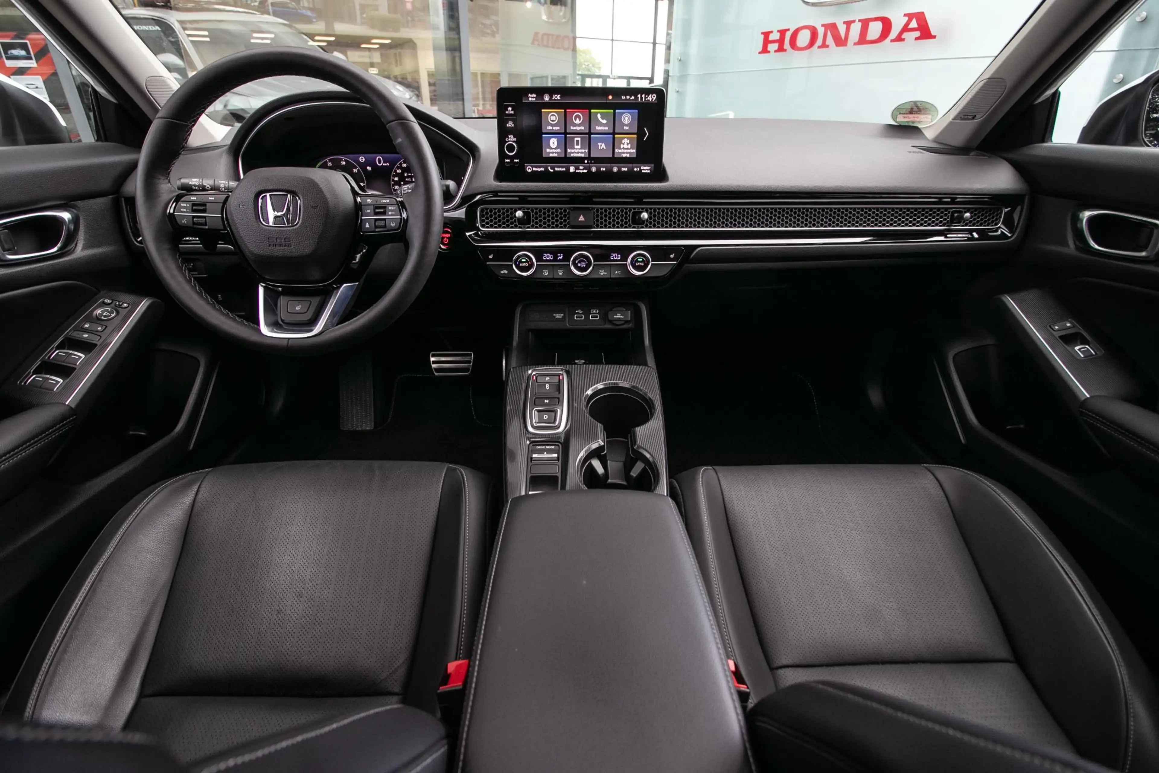 Honda Civic 2.0 e:HEV Advance — photo 13