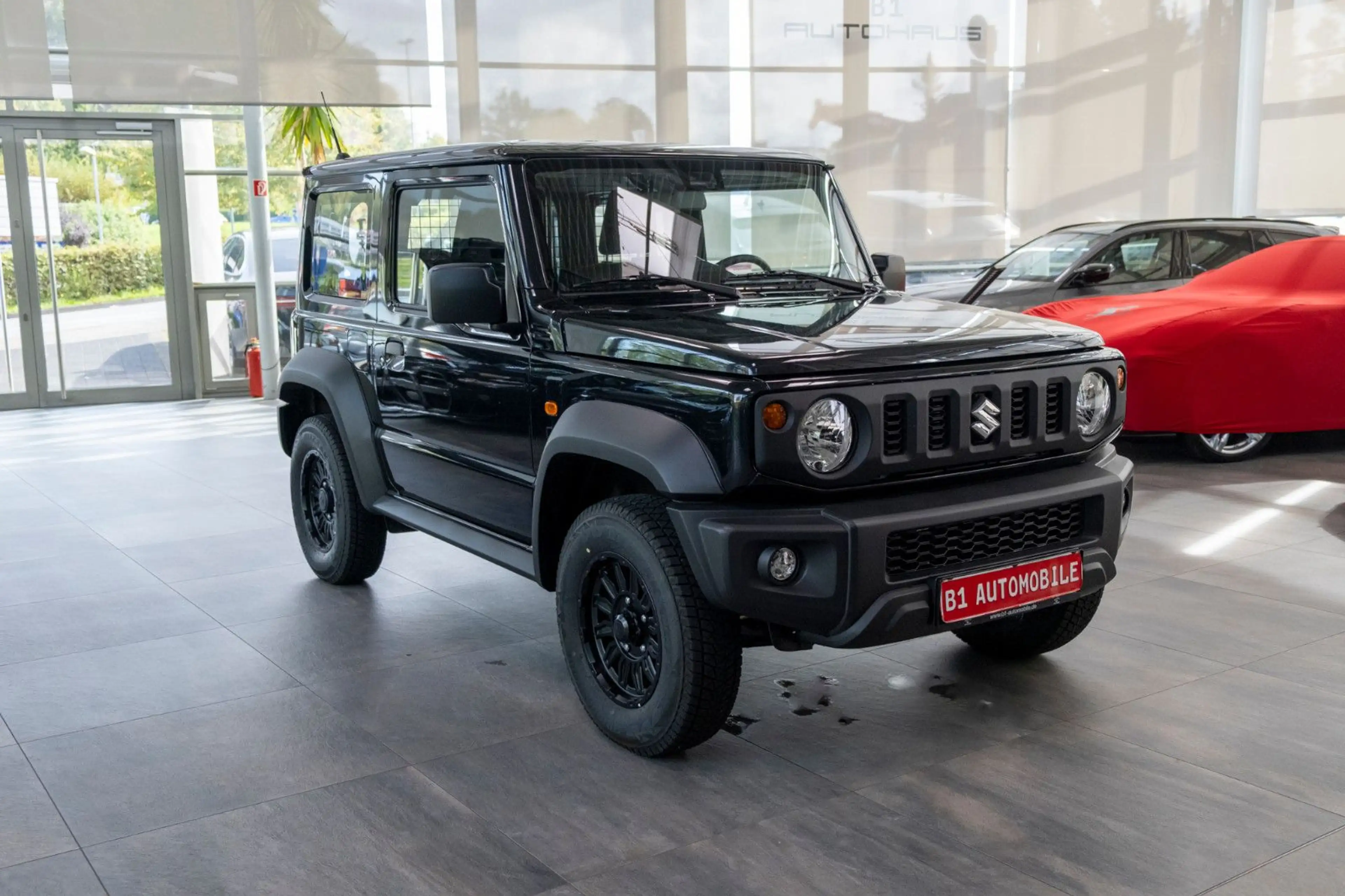 Suzuki Jimny Comfort AllGrip NFZ*AHK*ALUFELGEN*NEUWERTI — photo 3
