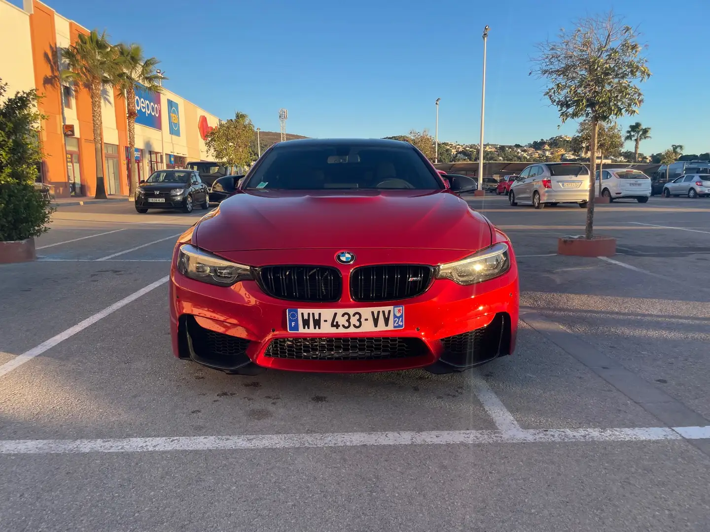 BMW M4 Coupé 450 ch Pack Competition Oranje - 1