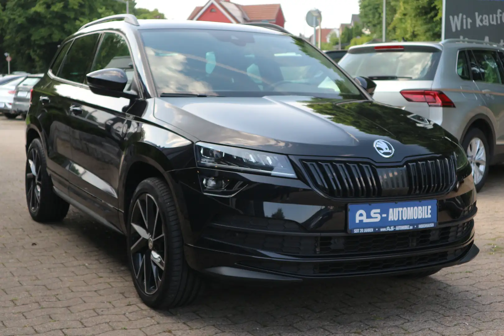 Skoda Karoq Ambition 4x4 *2.HAND/DSG/RFK/PANO/NAV/AHK* Schwarz - 1