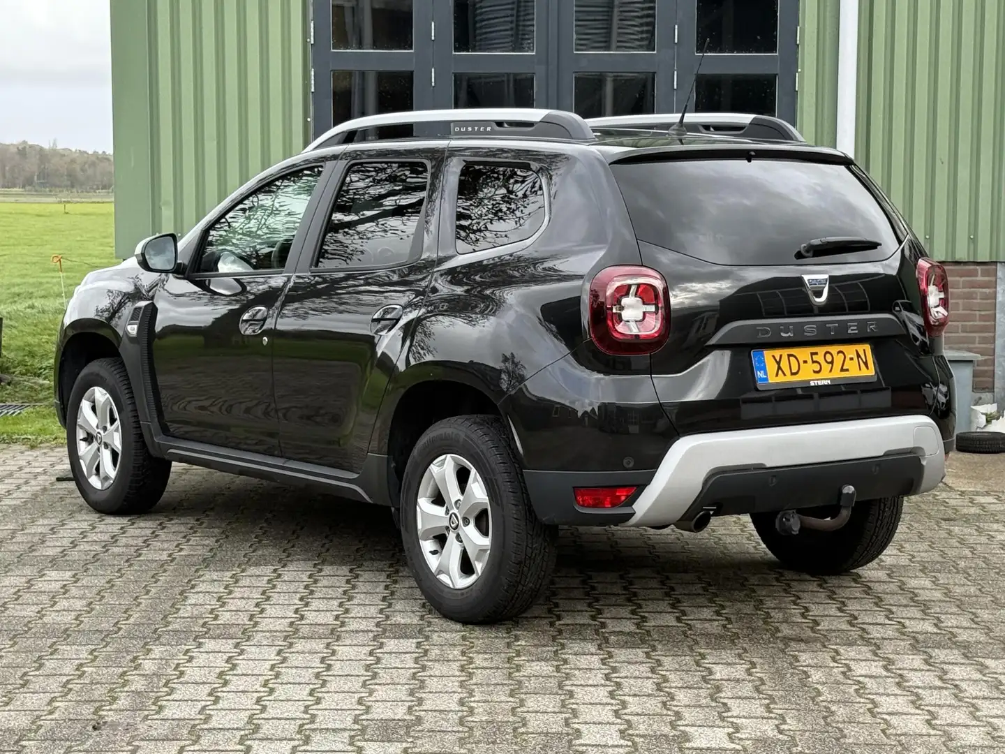 Dacia Duster 1.2 TCe Comfort | 1e Eigenaar | Trekhaak | Navigat Zwart - 2