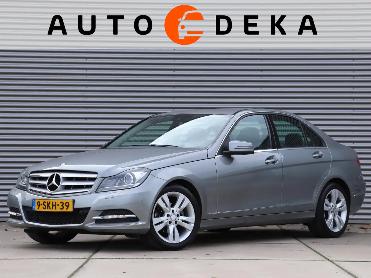Mercedes-Benz C 180 Ambition Avantgarde Automaat *1e Eigenaar* Grijs - 1