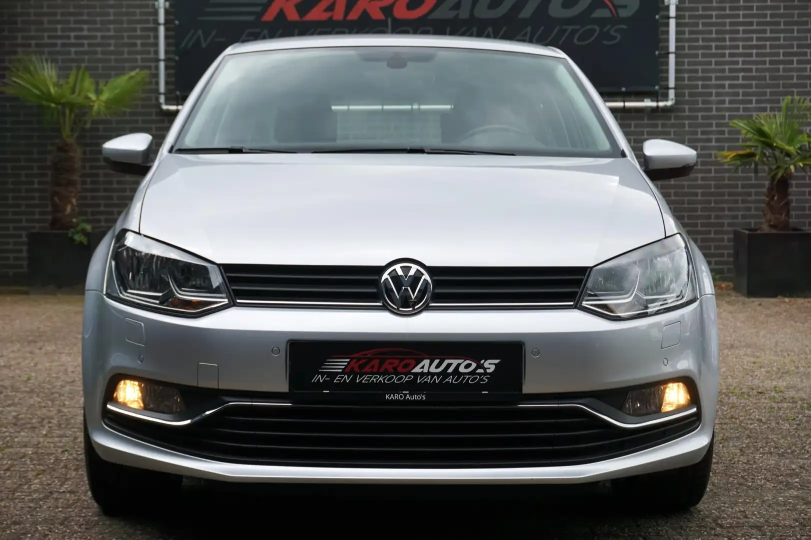 Volkswagen Polo 1.2 TSI Highl Cruise Clima Stoelv Pdc 1e Eig Gris - 2
