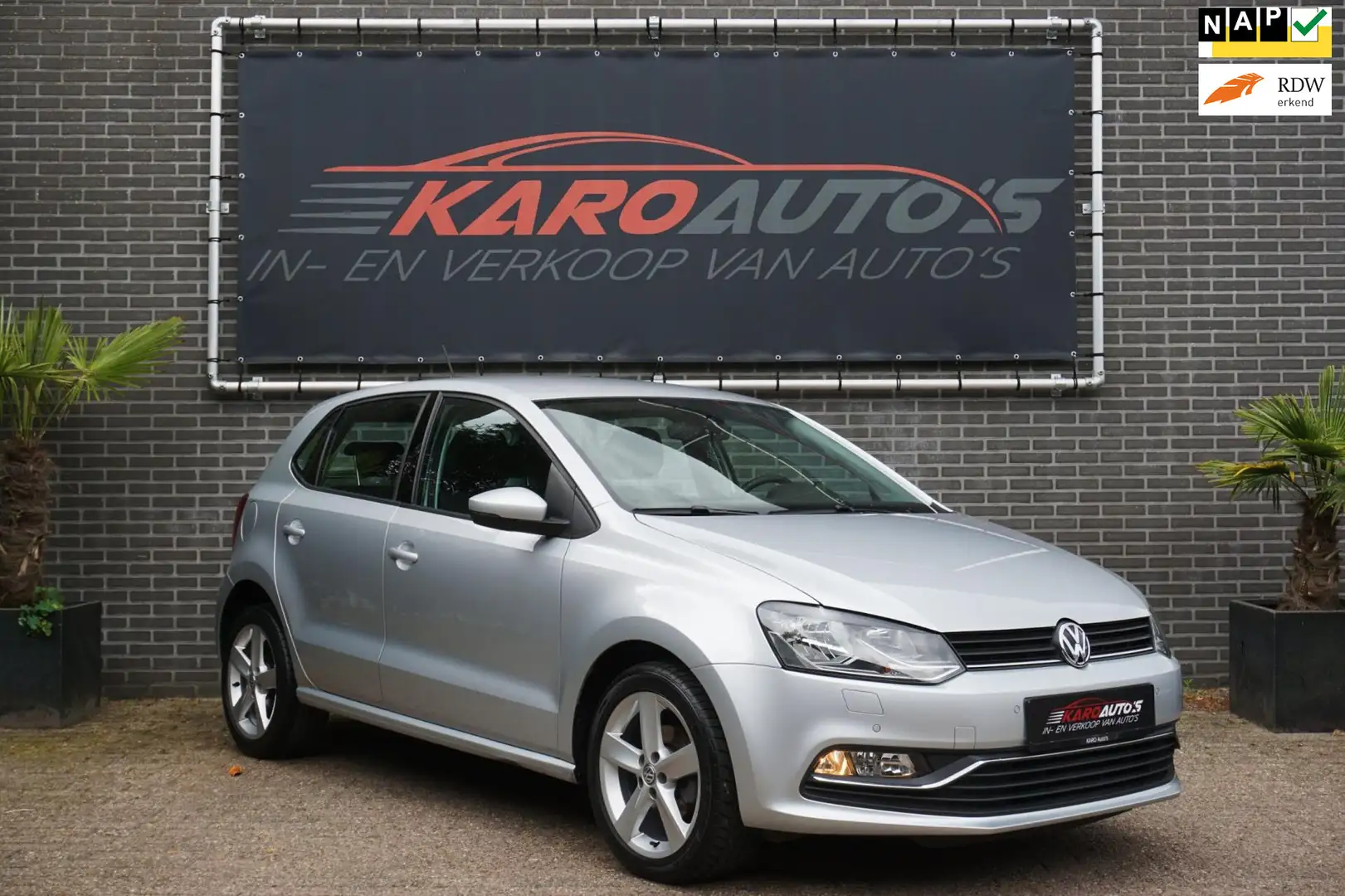 Volkswagen Polo 1.2 TSI Highl Cruise Clima Stoelv Pdc 1e Eig Gris - 1
