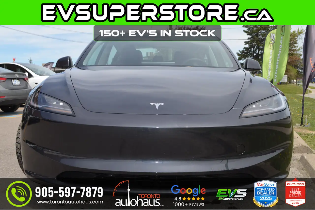 Tesla Model 3 photo Tesla Model 3