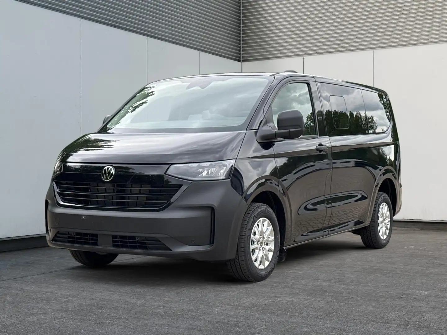 Volkswagen T7 Caravelle Basis KR 8-Sitzer+AHK+LED+KAM+PDC+SHZ+ALU+GJR 2... Schwarz - 1