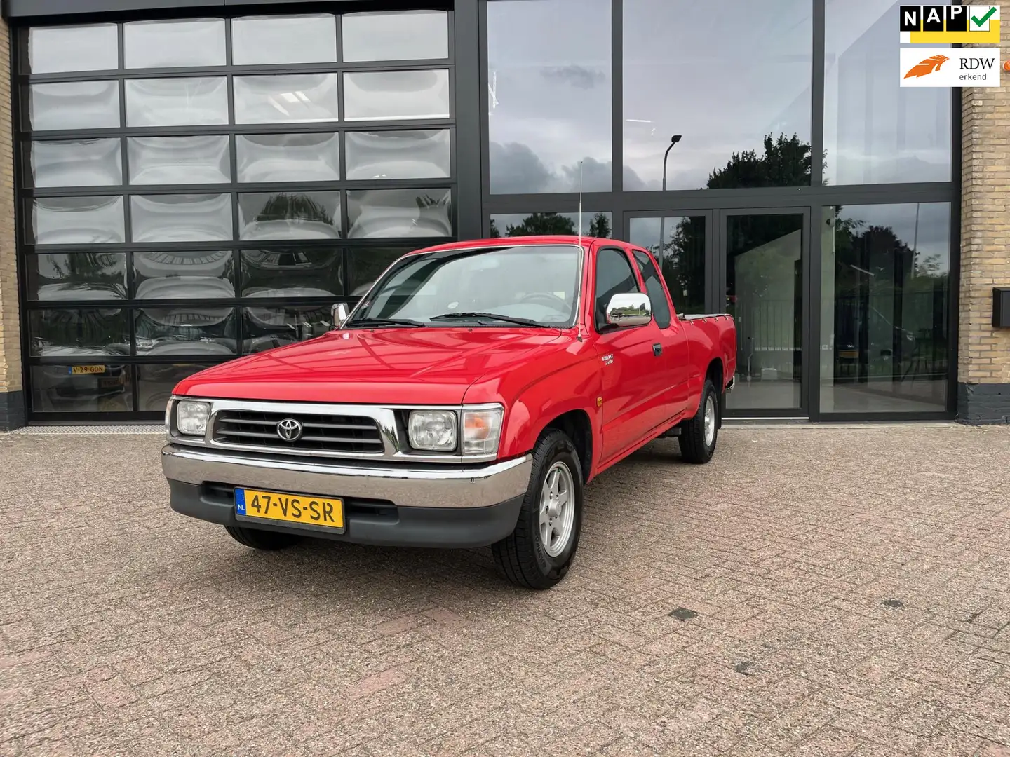 Toyota Hilux 2.4 Xtra Cab Pick-UP, 1 eigenaar, Uniek, Airco Rouge - 1