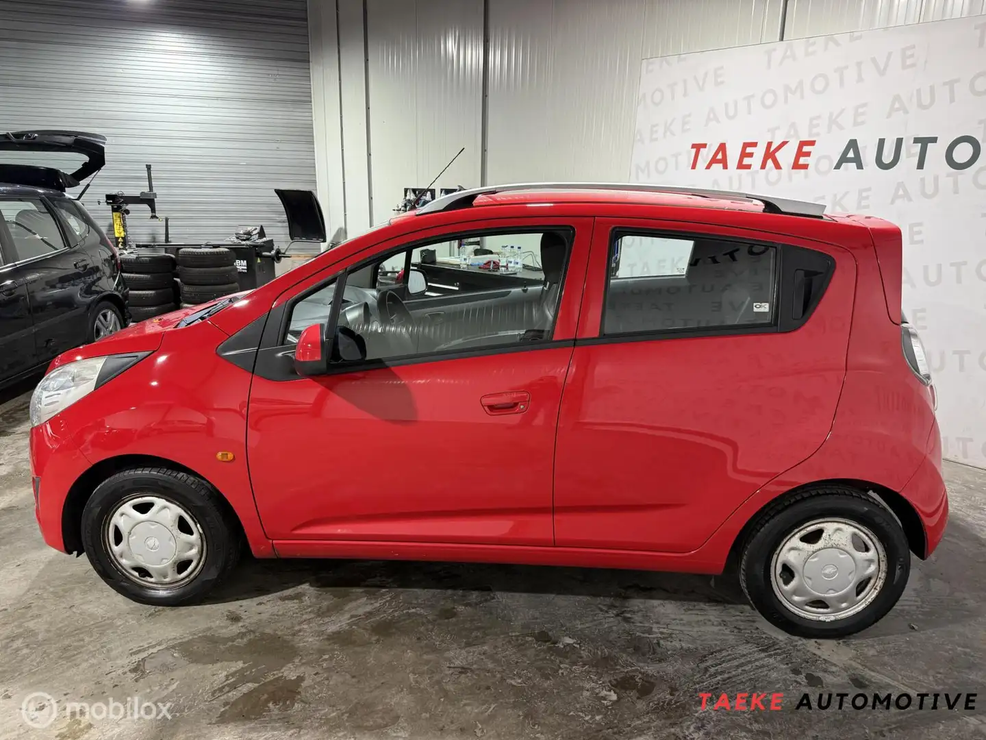 Chevrolet Spark 1.0 16V LS Airco/1e EIG/Nap Rojo - 2