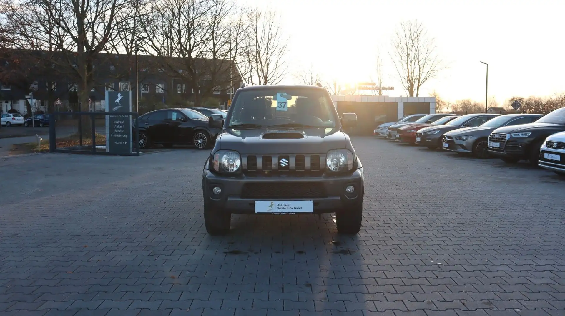 Suzuki Jimny Style 4x4 Leder Navi SitzHz. Klima AHK Grau - 2