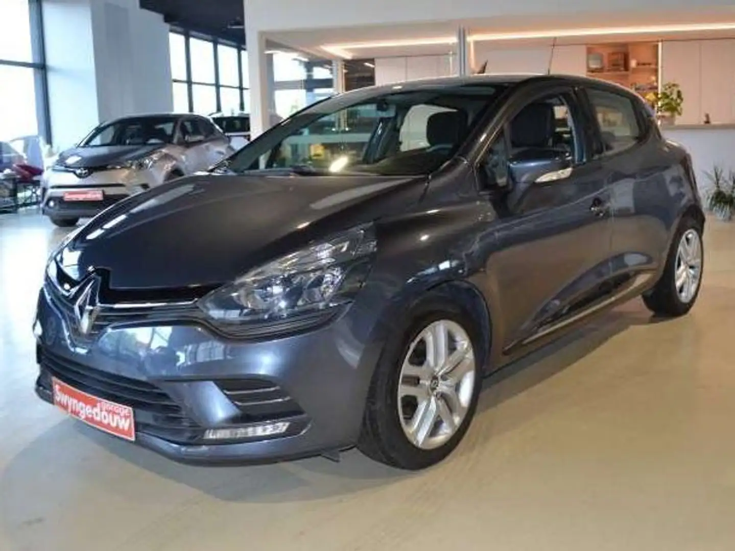 Renault Clio Clio 1.2 16V 75 airco,navi,pdc,garantie Grijs - 1