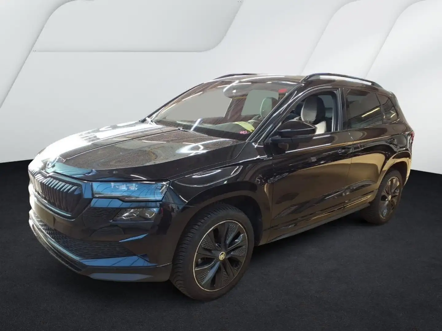 Skoda Karoq Sportline 1.5 TSI Panorama AHK PDC GRA SItzh. Schwarz - 1