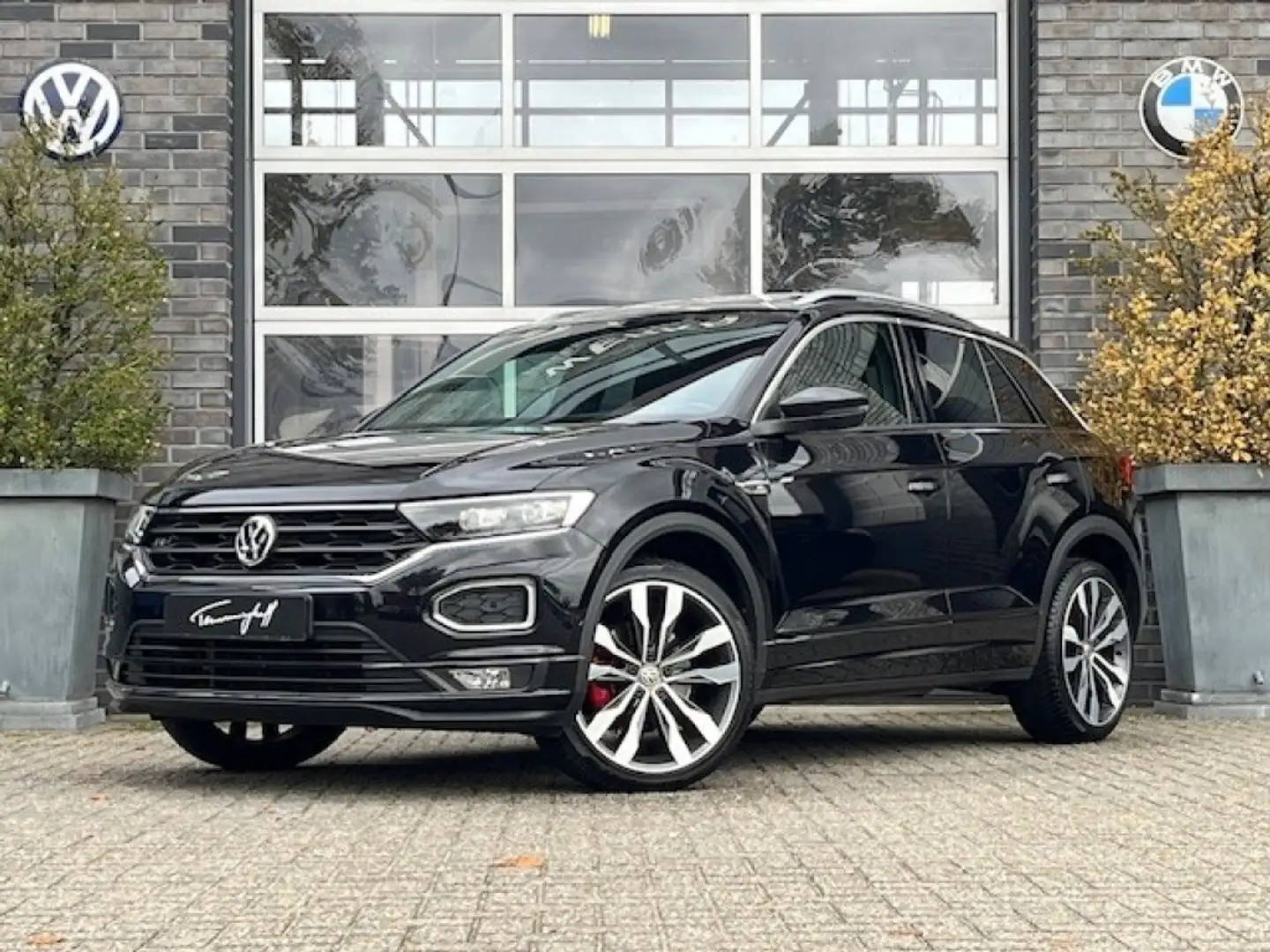 Volkswagen T-Roc 1.5 TSI AUT. SPORT R-LINE BEATS - VIRTU - PANO. DA Zwart - 1
