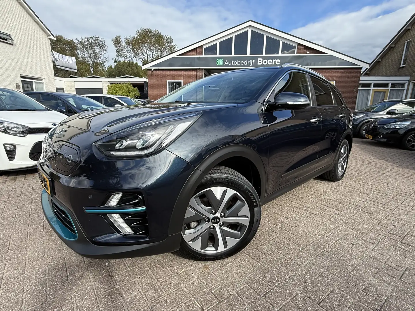 Kia e-Niro DynamicPlusLine 64 kWh 3-Fase, Schuif-/kanteldak, Blauw - 1