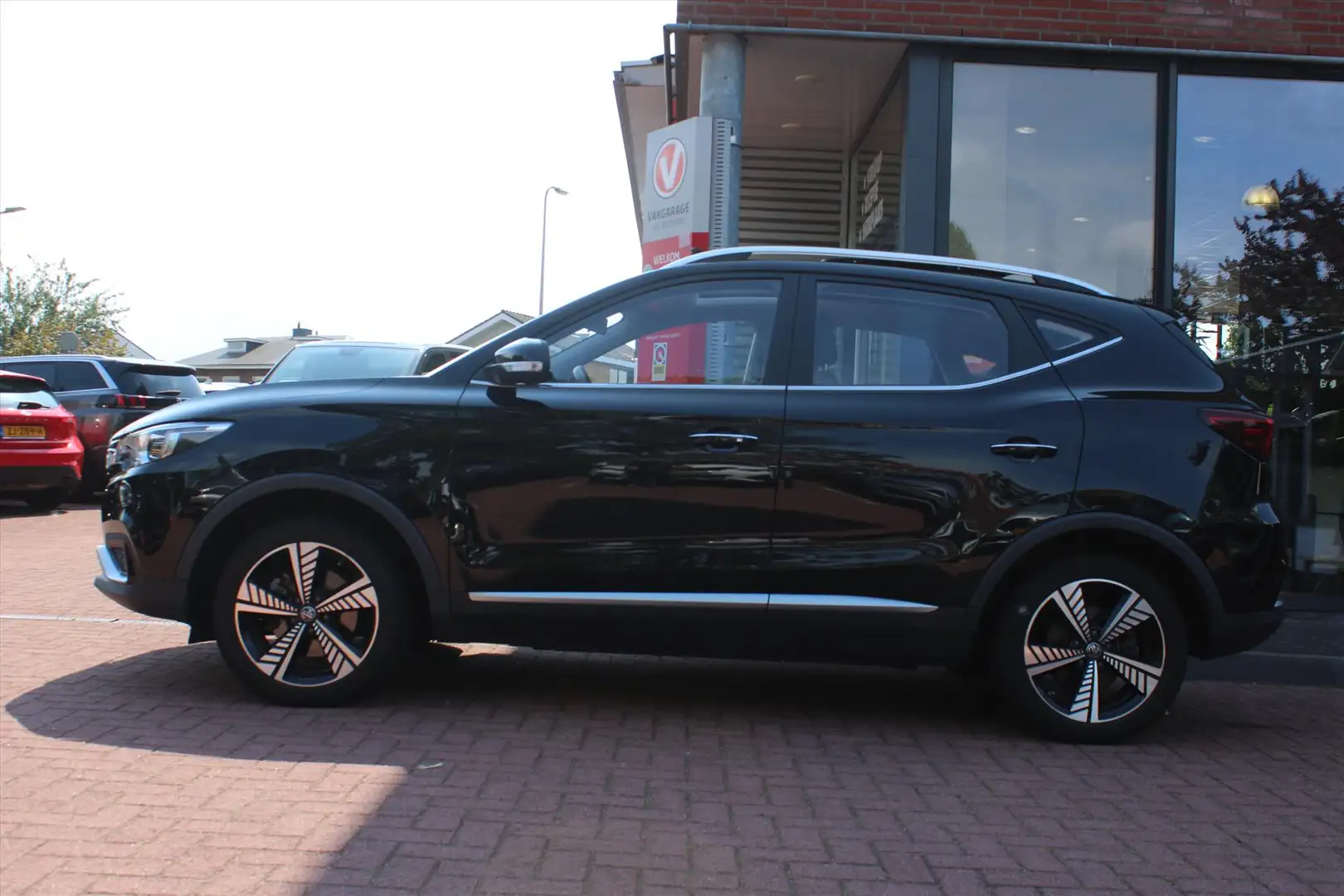 MG ZS Ev Electric *Luxury* | Carplay | Camera | Adaptive Zwart - 2