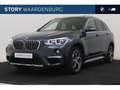 BMW X1 xDrive20i High Executive xLine Automaat / Panorama Grijs - thumbnail 1
