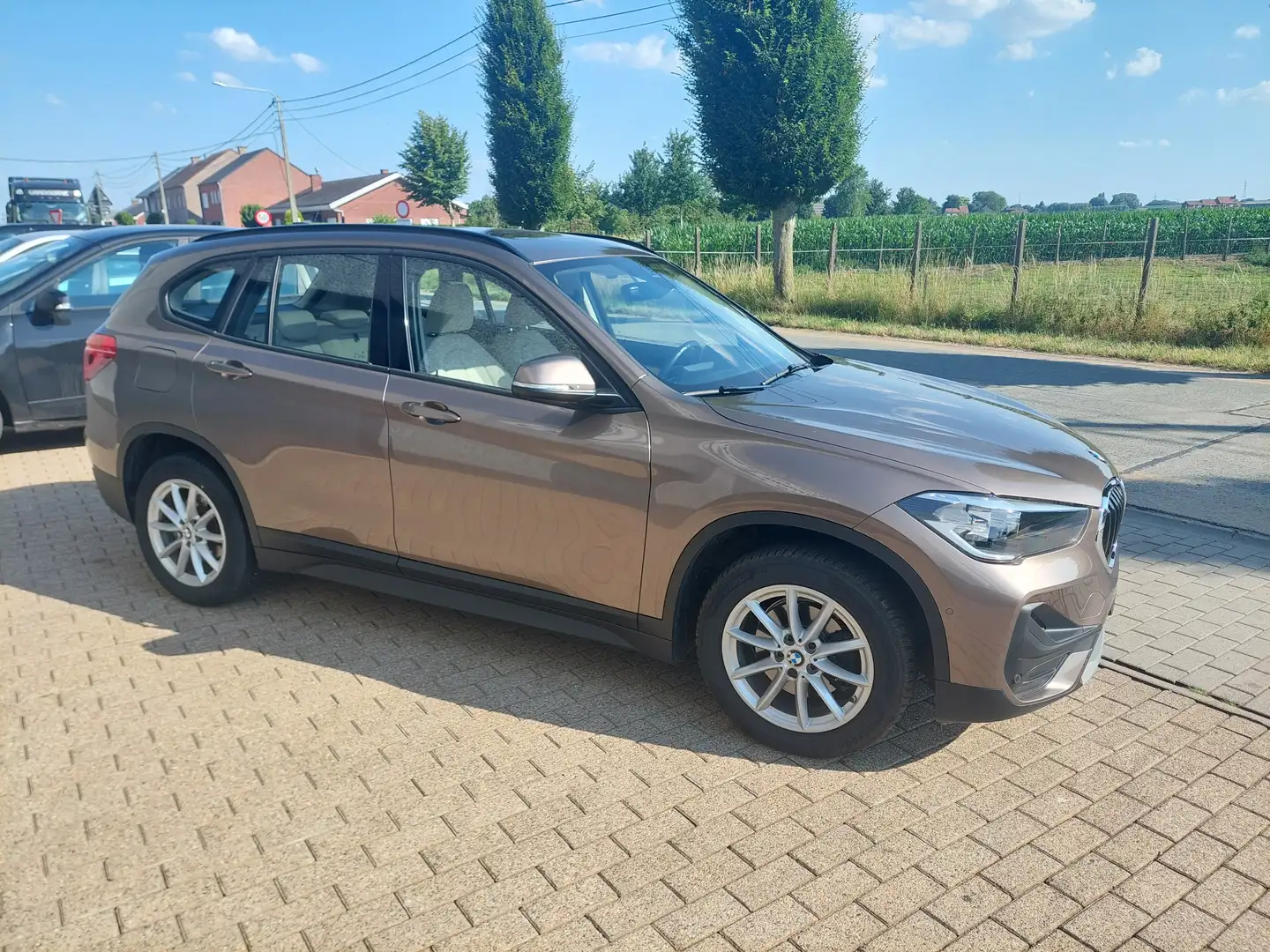 BMW X1 X1 IN OPTIE Bronce - 1