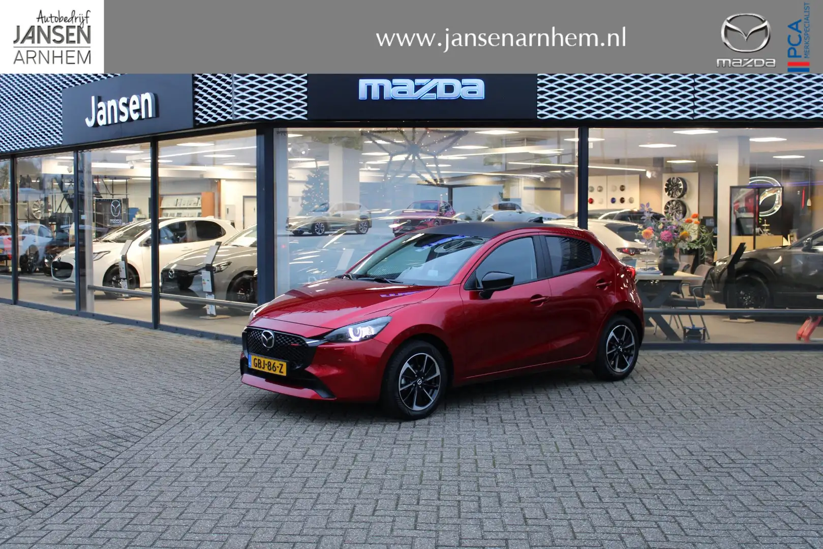 Mazda 2 1.5 e-SkyActiv-G 90 Homura Aka , Adap. Cruise, HUD Rood - 1