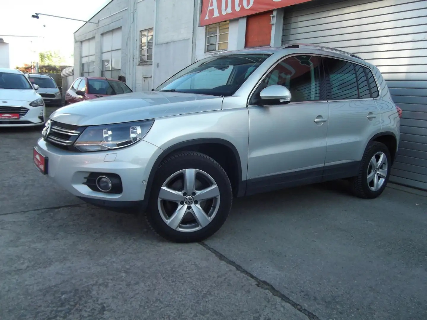 Volkswagen Tiguan Track & Style 4Motion Orgi. 47800 Km Silber - 1
