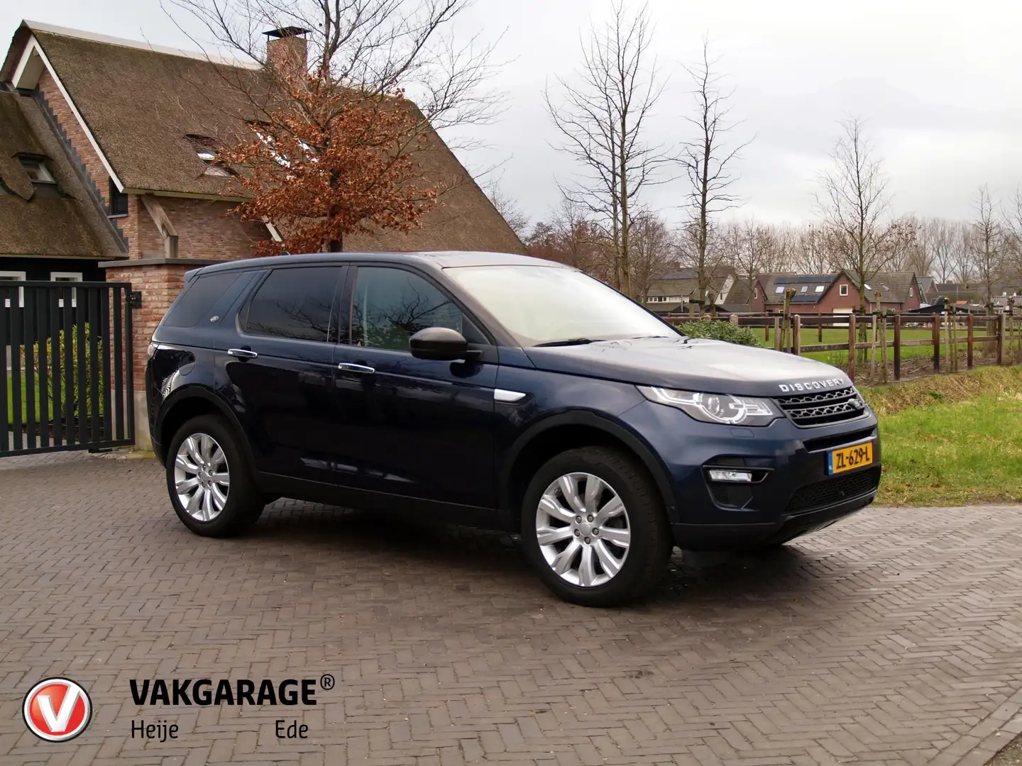 Land Rover Discovery Sport 2.0 Si4 4WD HSE Luxury | Camera | Cruise Control | Blauw - 1