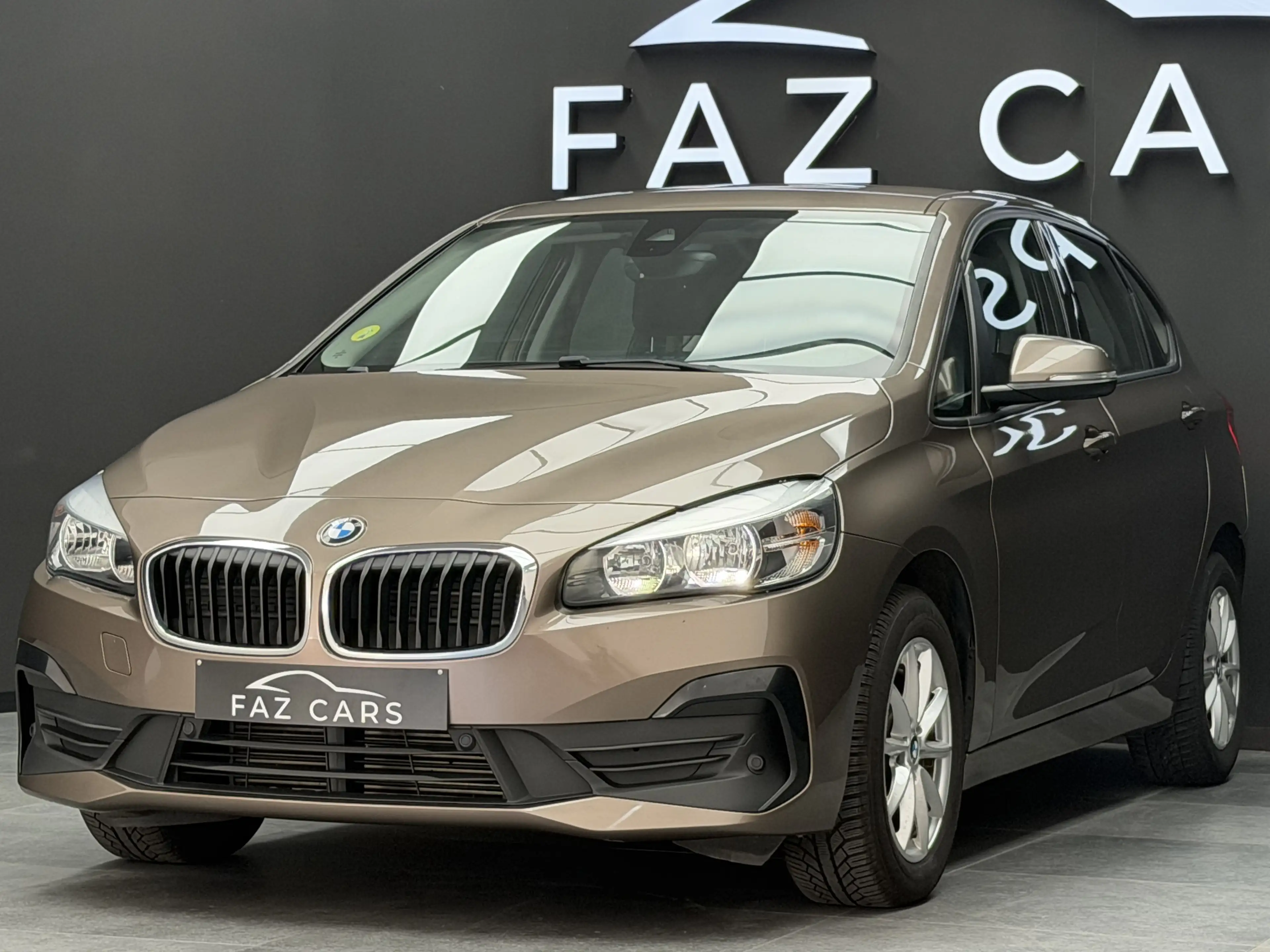 BMW 216 d Active Tourer *1ER PROP + GPS + CLIM + GARANTIE* — photo 2