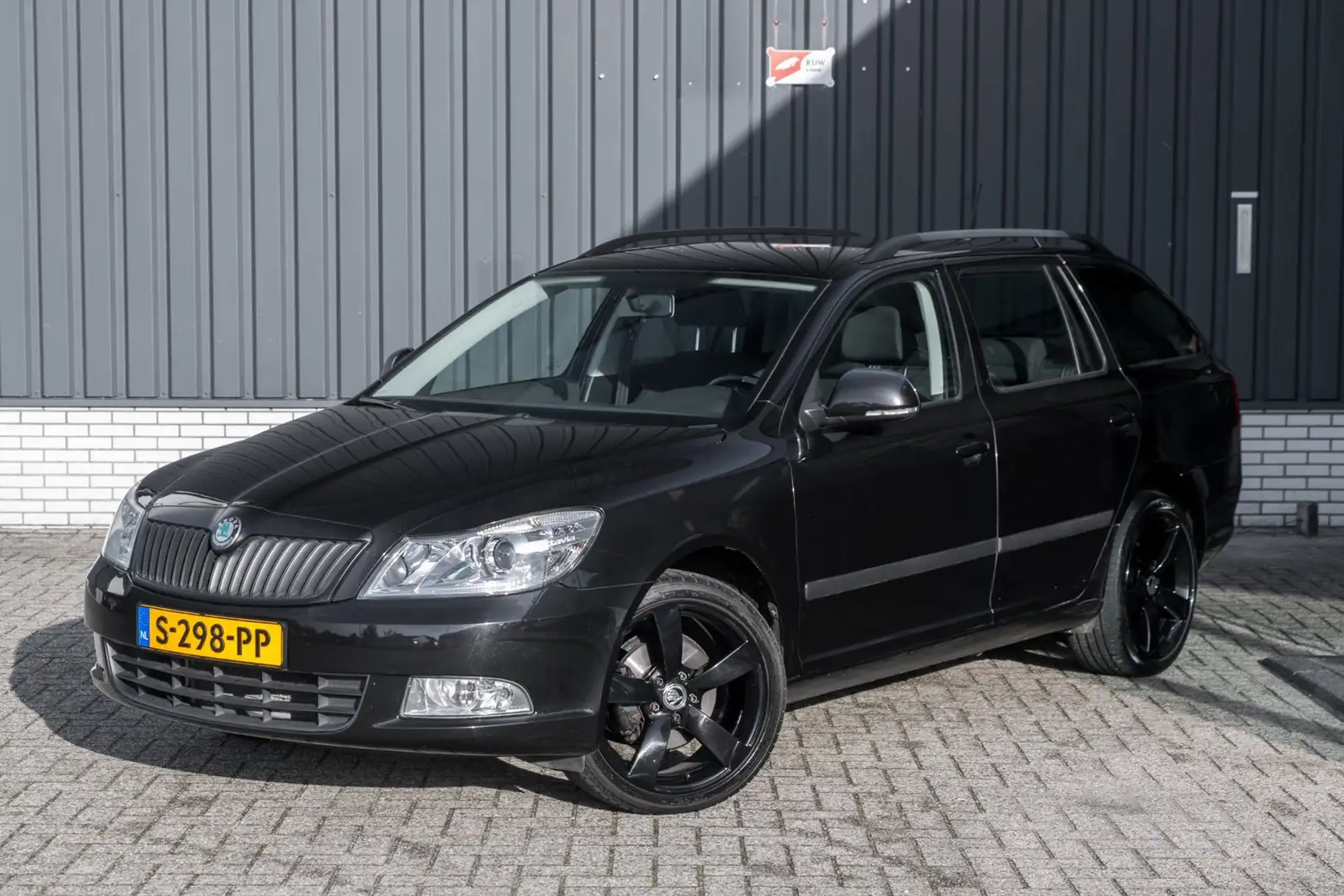 Skoda Octavia Combi 1.8 TSI 4x4 Ambition*Airco* Noir - 1