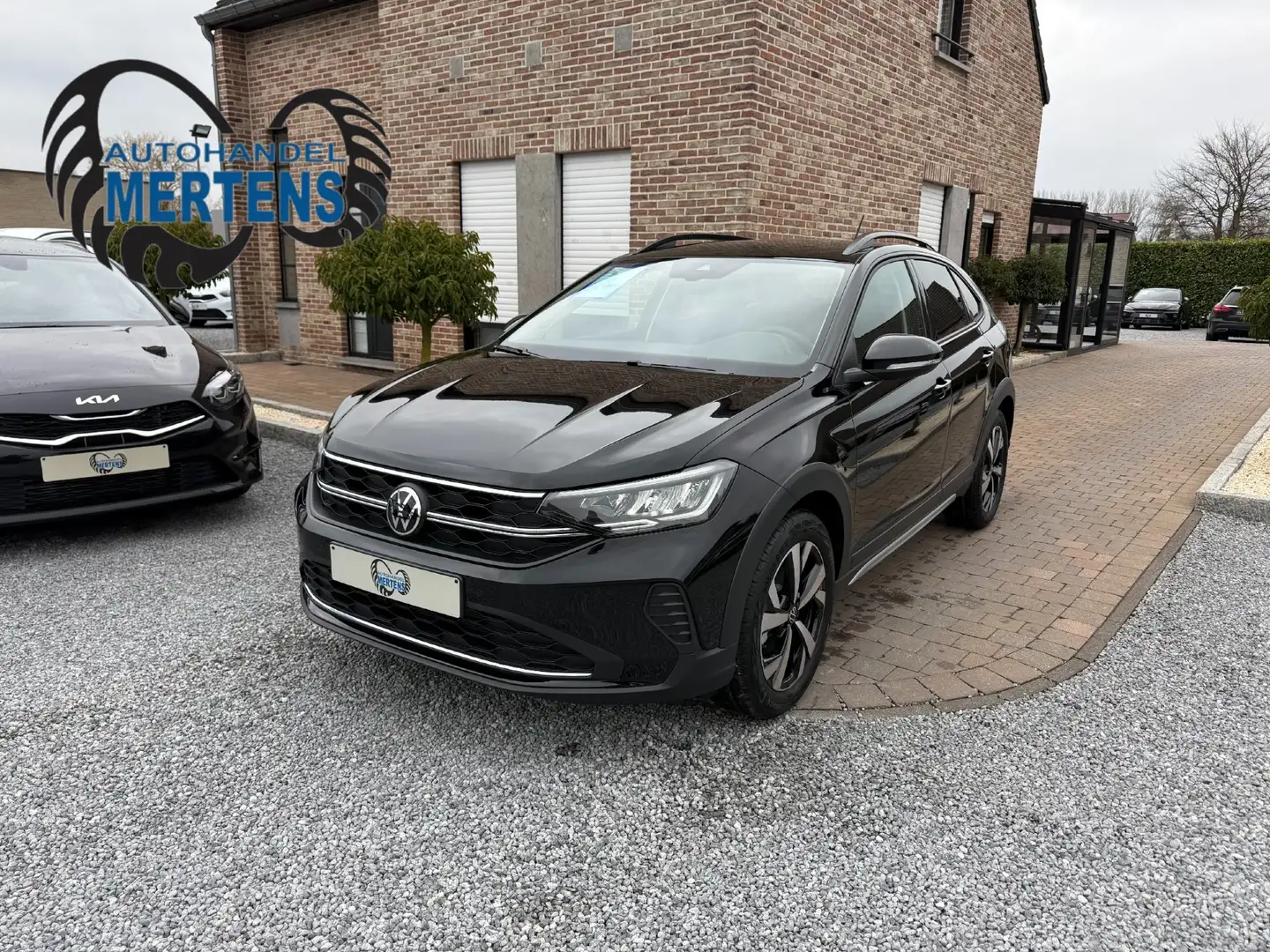 Volkswagen Taigo 1.0 TSI DSG 115PK EDITION CARPLAY AR/CAM NIEUW 0KM crna - 1