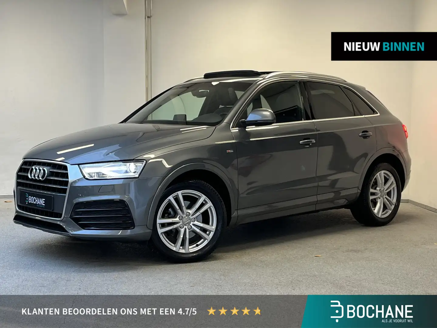 Audi Q3 1.4 TFSI CoD S-line | 1e-EIG. | PANO | DEALERONDER Gris - 1