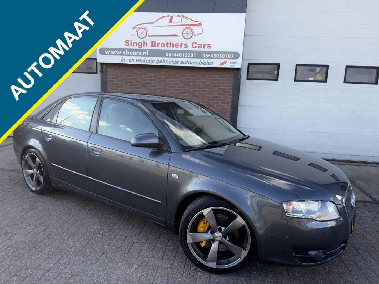 Audi A4 Limo 3.2 FSI Q NAP AUT LEER NAVI XENON INRUIL MOG! Grijs - 1