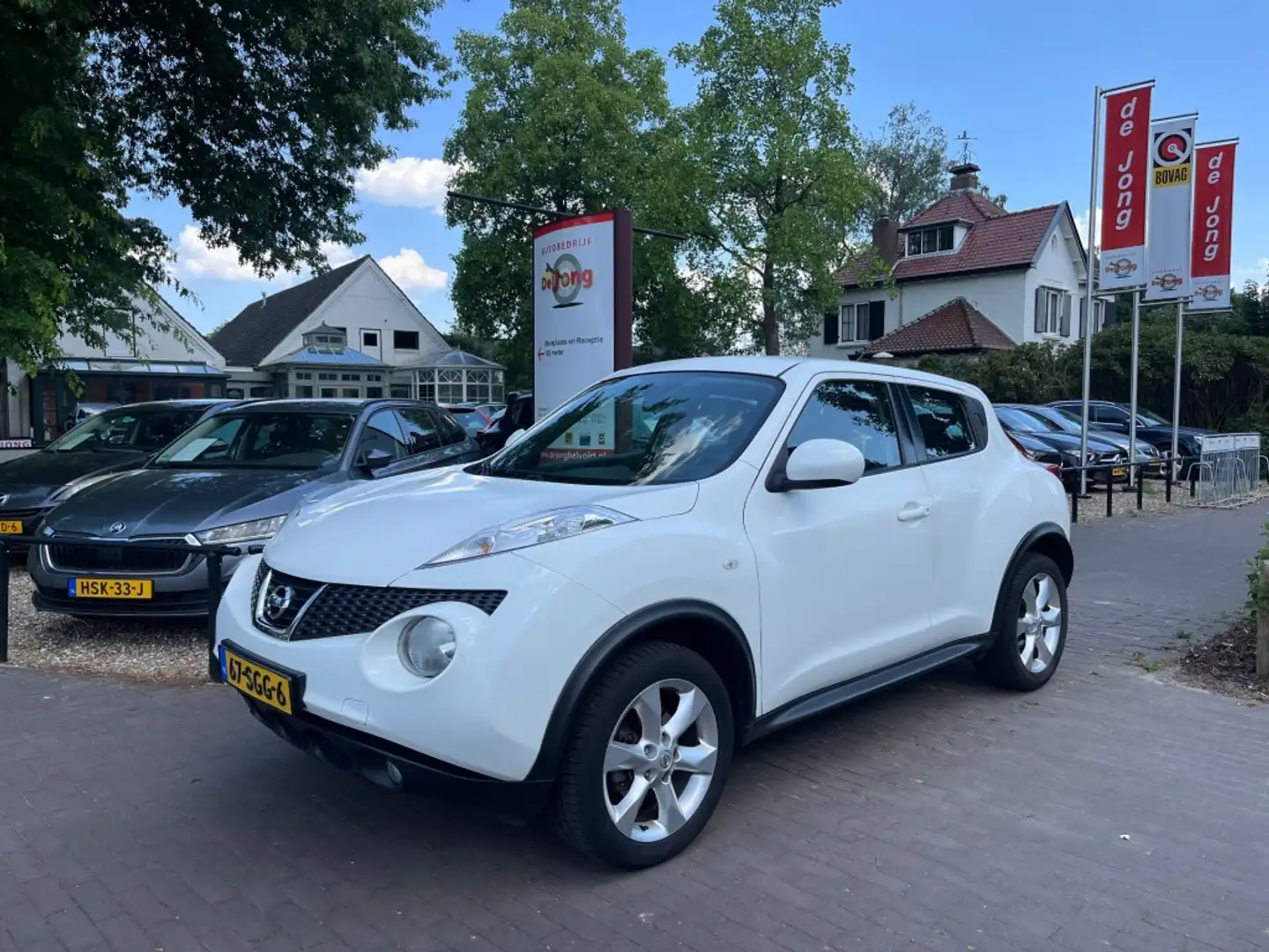 Nissan Juke 1.6 ACENTA ECO / NAVI / CAMERA / AFN. TREKHAAK / C Wit - 1