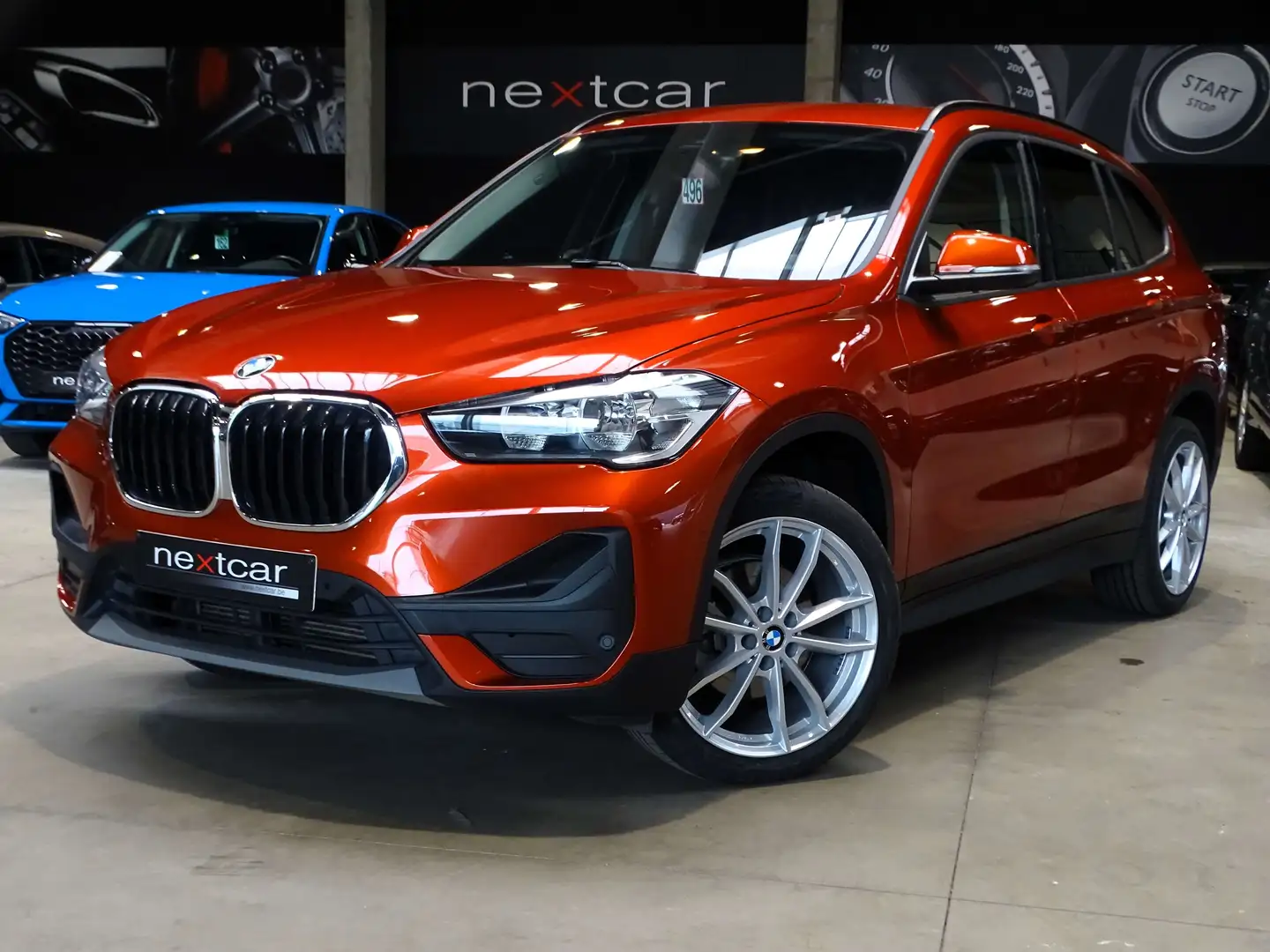 BMW X1 18dA SDrive *NAVI PRO-CRUISE-PARKING AV\u0026AR* Orange - 1