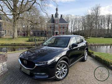 2.5 SkyActiv-G | HUD | Bose | Trekhaak | Memory |