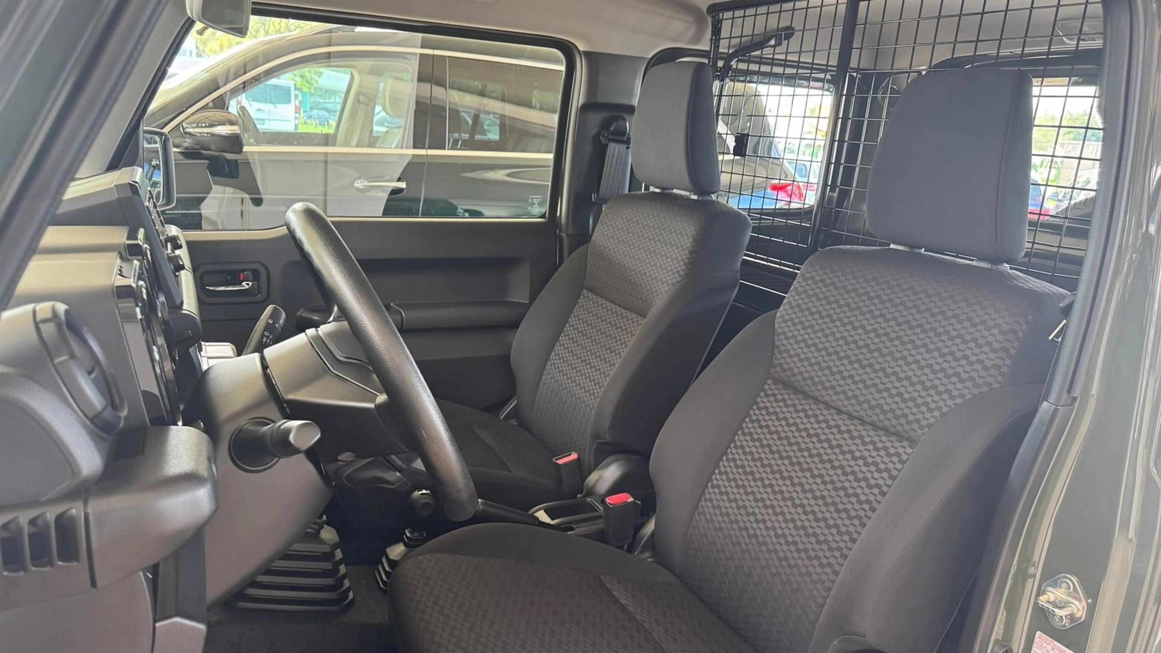 Suzuki Jimny Comfort 4x4/Klima/Sitzheizung/wenig Km — photo 10