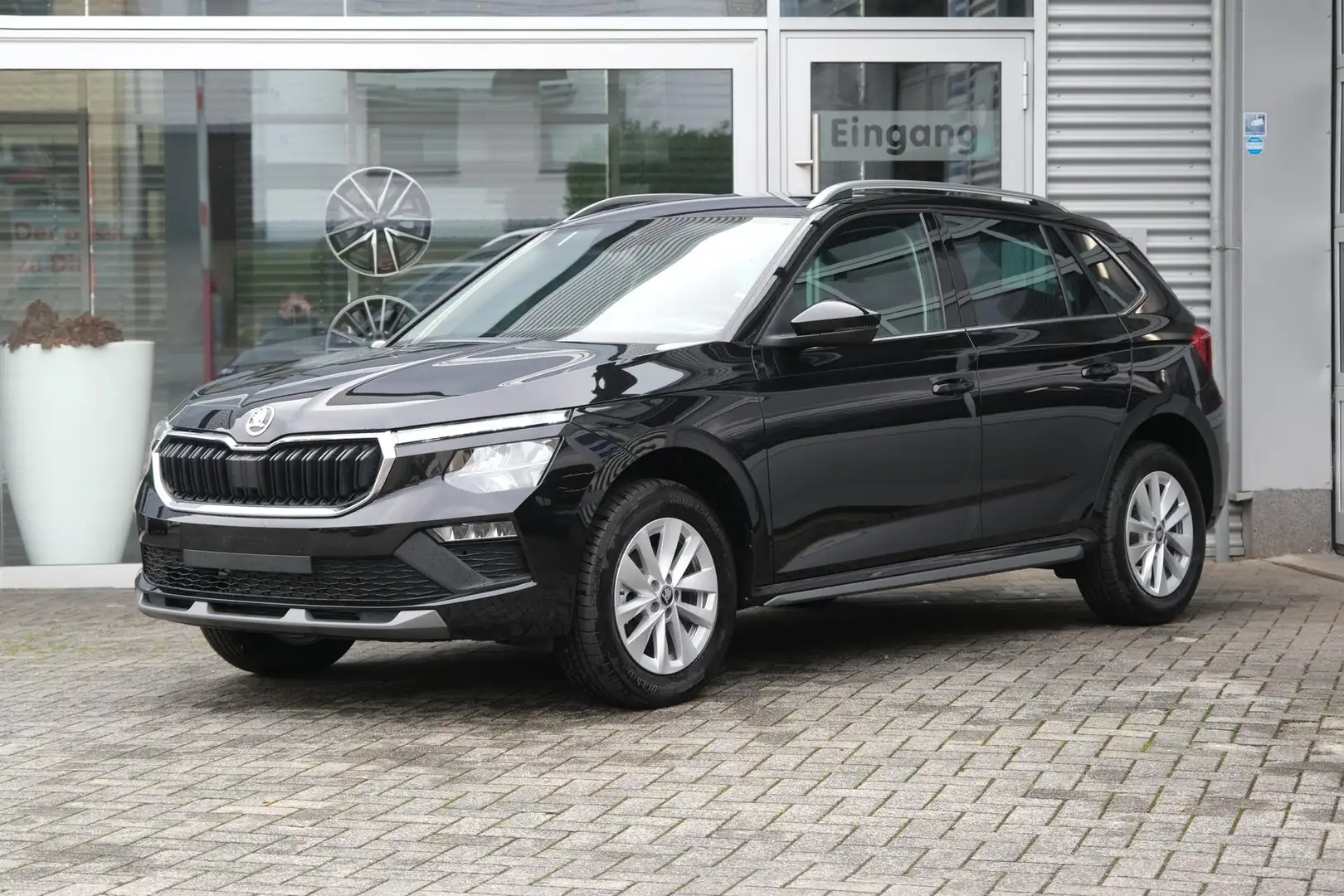 Skoda Kamiq Top Selection 1.0 TSI LED App-Navi Sitzheizung PDC Noir - 1