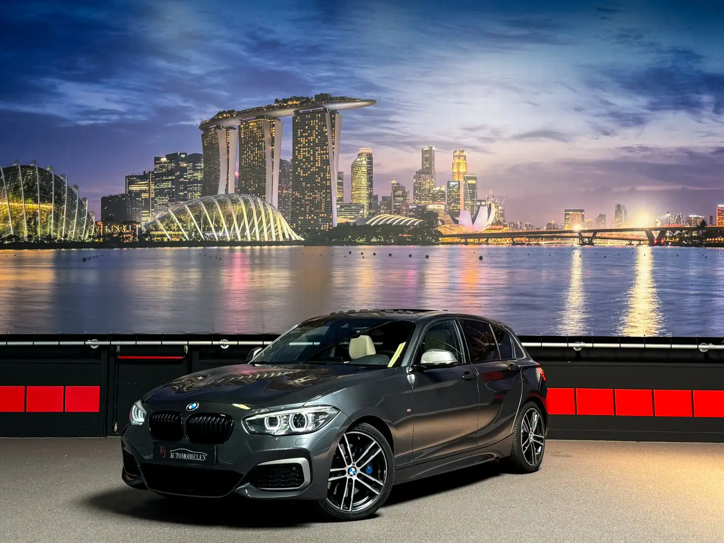 BMW 140 1-serie M140i xDrive High Executive 6cilinder|Pano Grijs - 1