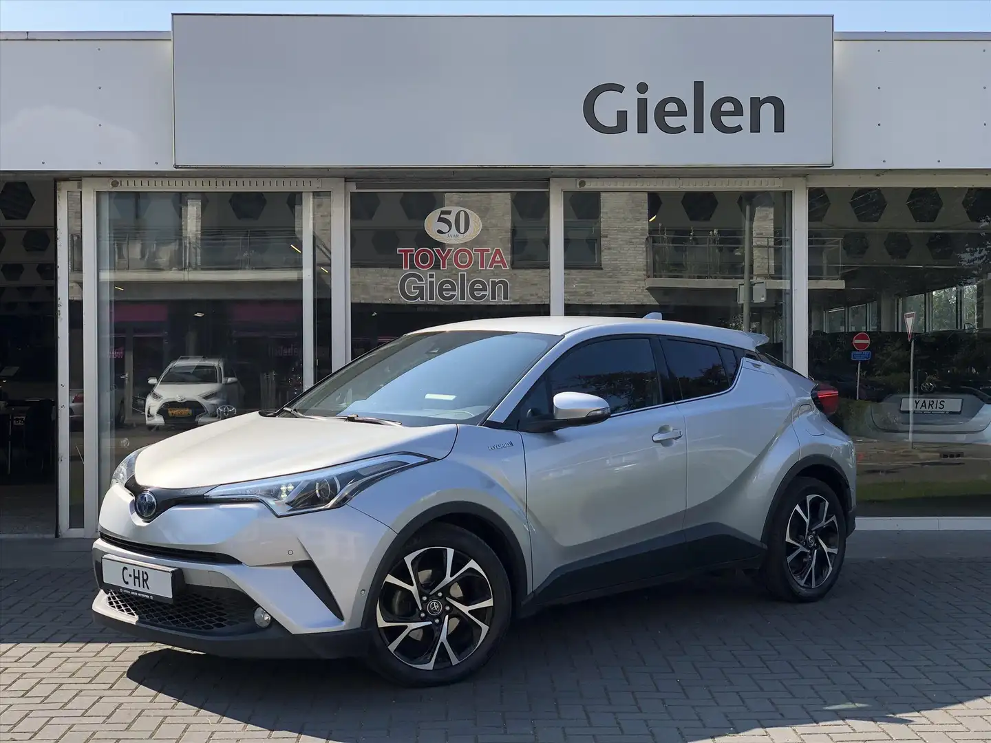 Toyota C-HR 1.8 Hybrid Style | Dodehoekherkenning, Parkeersens Grijs - 1
