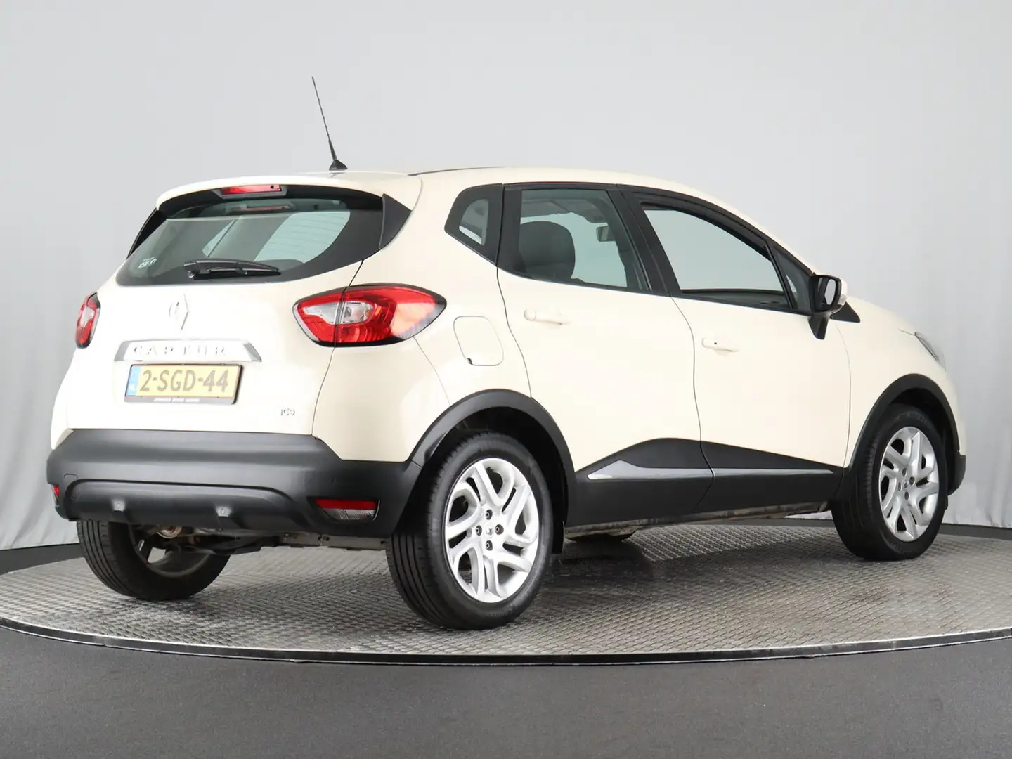 Renault Captur 1.2 TCe Dynamique (NL-Auto / Navi / Cruise / Bluet Bruin - 2