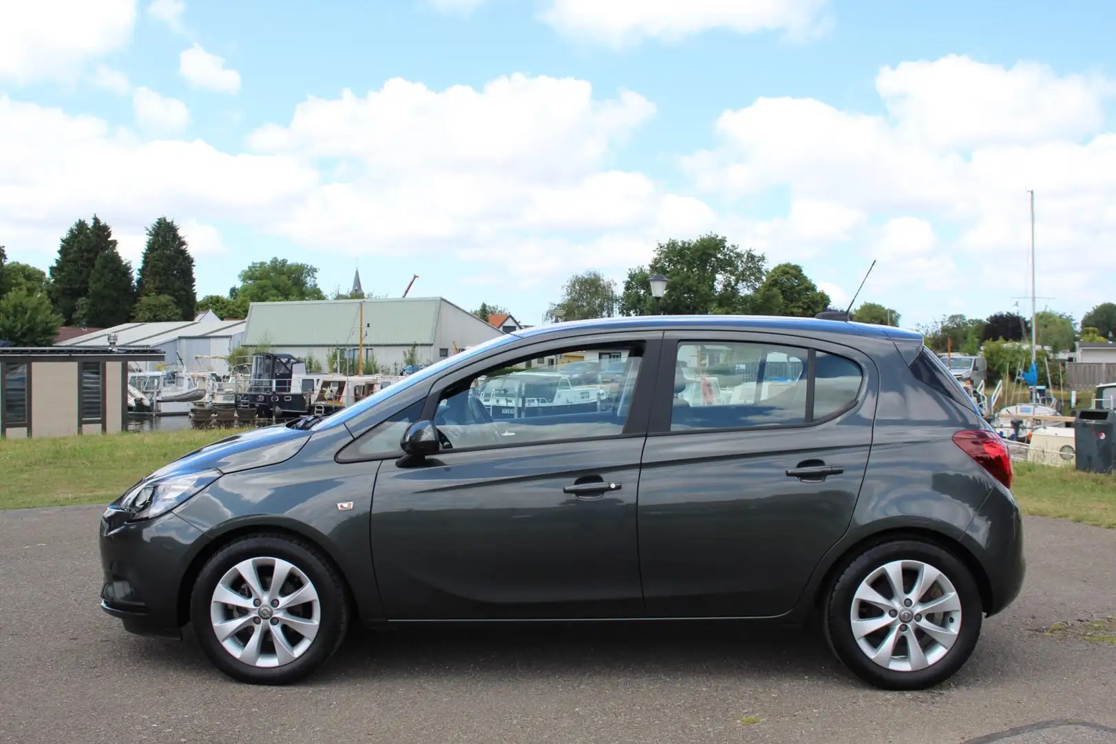 Opel Corsa 1.4 Favourite *NAP *NAVI *CRUISE Grijs - 2