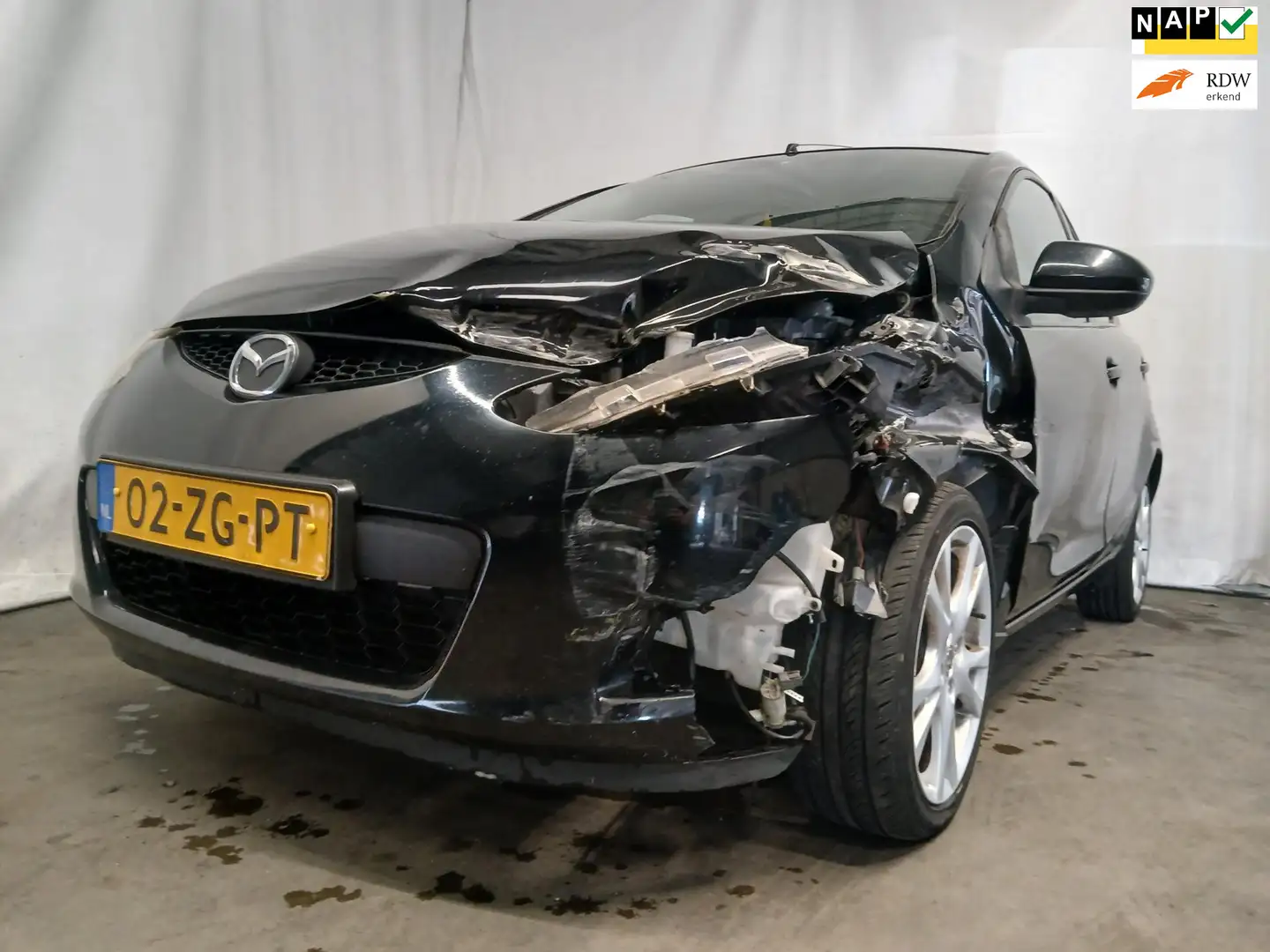 Mazda 2 1.3hp S-VT Executive - Airco - Schade Zwart - 1