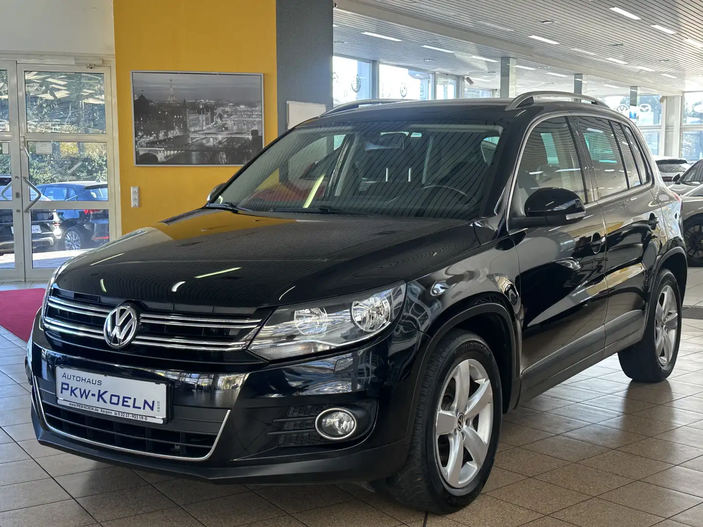 Volkswagen Tiguan 2.0 TDi Sport & Style BMT *NAVi DiSC*PDC* Schwarz - 1